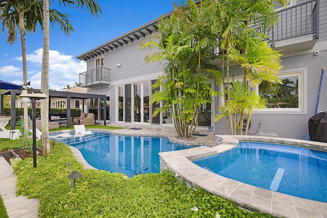 view of pool featuring a patio area and an outdoor hangout area