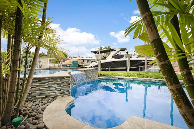 view of pool featuring pool water feature