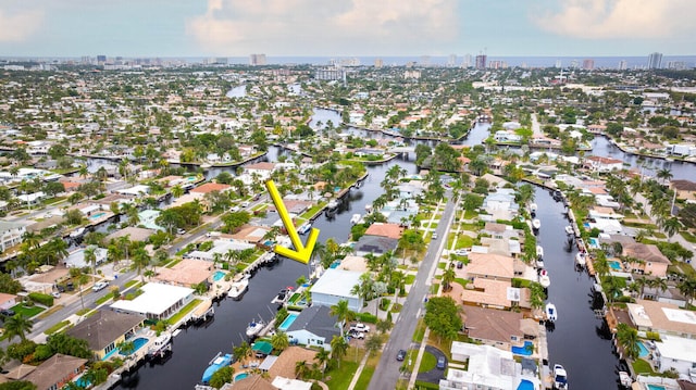 bird's eye view with a water view