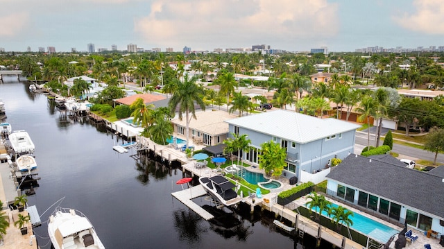 bird's eye view with a water view