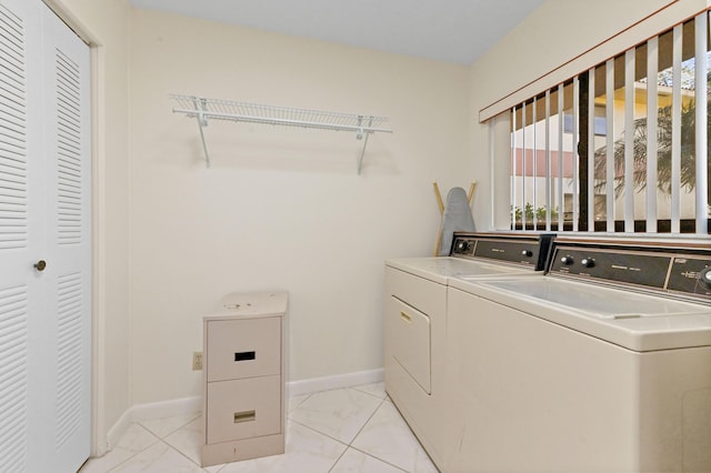 washroom with washer and dryer