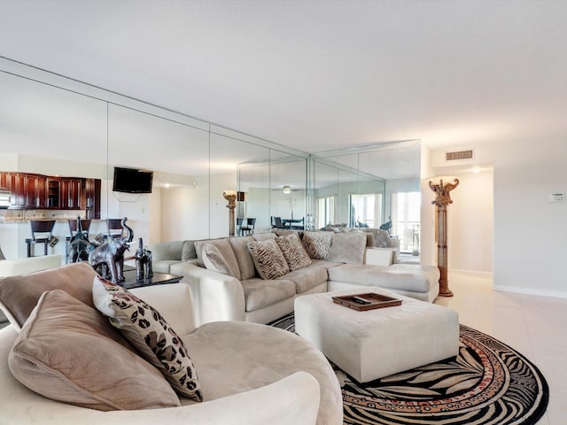 living room featuring light tile patterned flooring