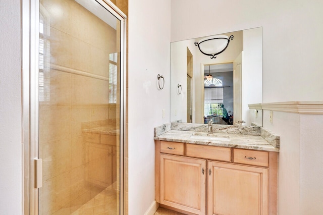 bathroom with vanity and walk in shower