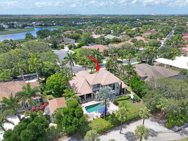 bird's eye view with a water view