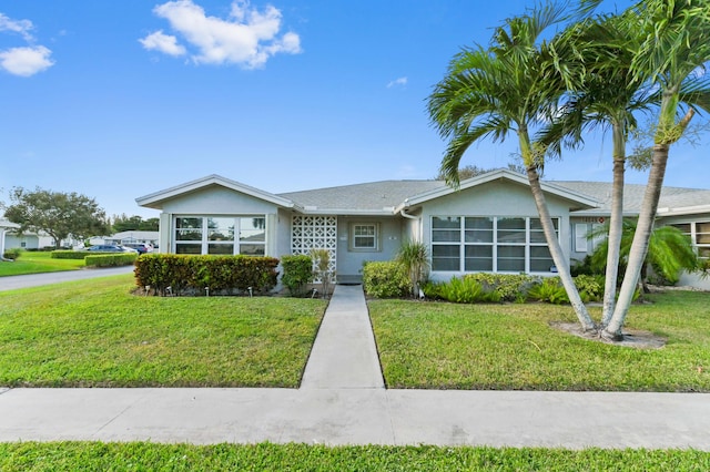 ranch-style house with a front yard