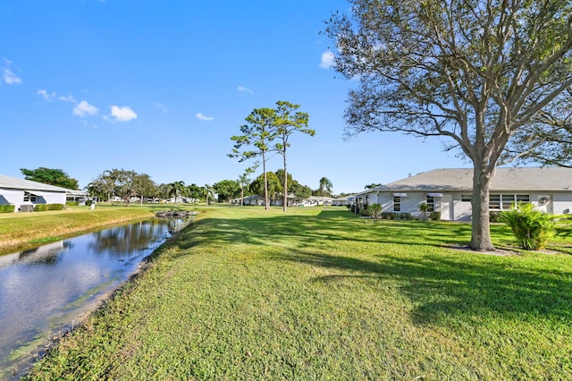 view of yard with a water view