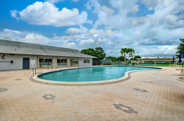 view of pool featuring a patio area