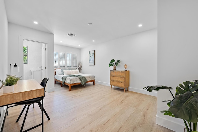 bedroom featuring light wood-type flooring