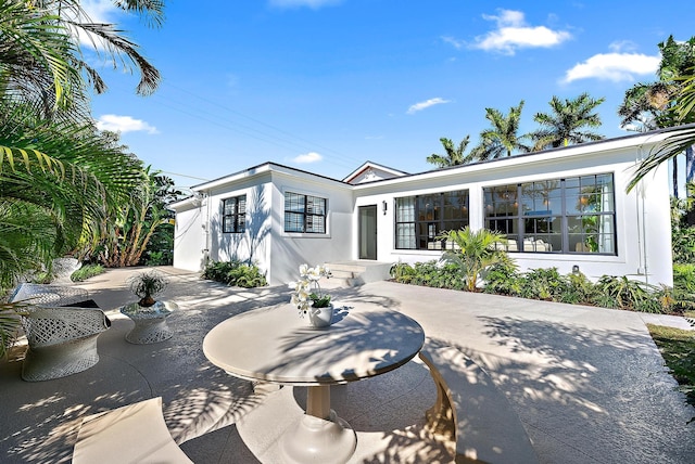 back of house featuring a patio