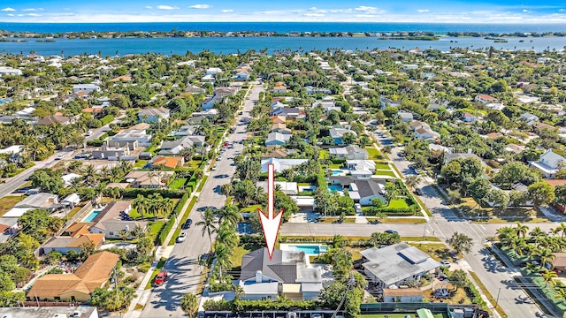 drone / aerial view with a water view