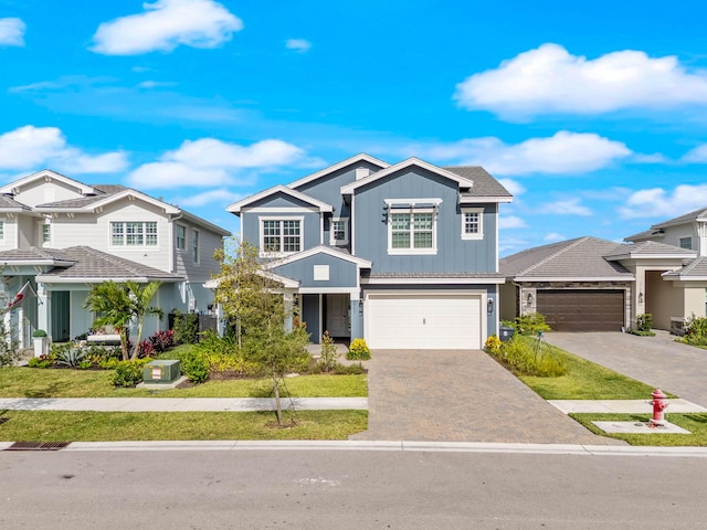 view of front of property featuring a garage