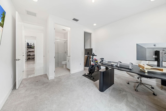 office area featuring light colored carpet