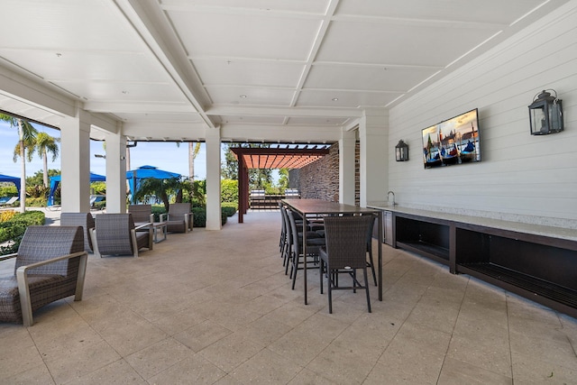 view of patio / terrace featuring an outdoor bar