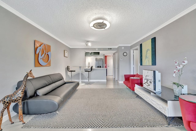 living room with ornamental molding and a textured ceiling