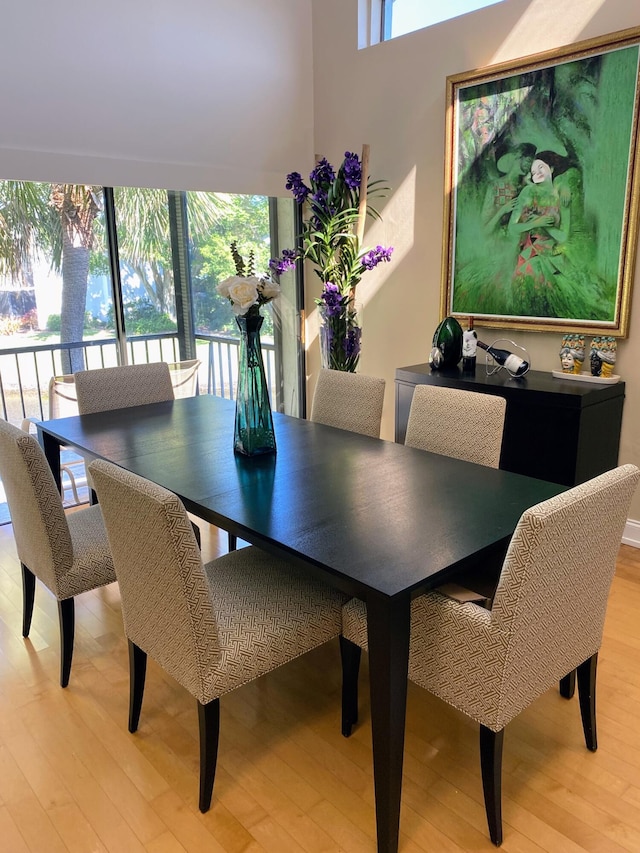 dining area with light wood-type flooring