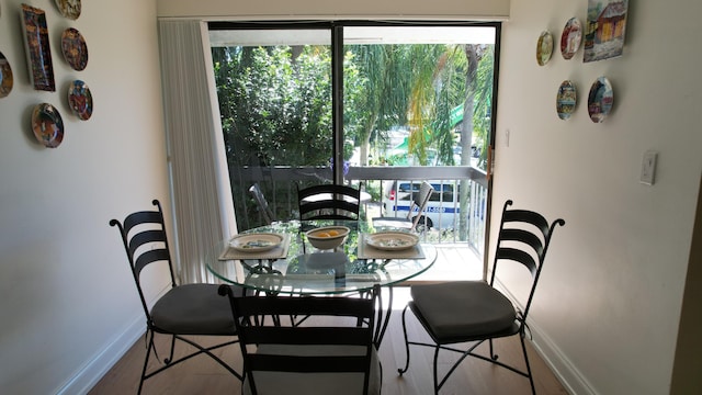 dining area featuring hardwood / wood-style flooring