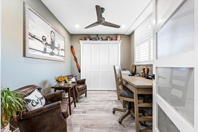 office area with ceiling fan and light wood-type flooring