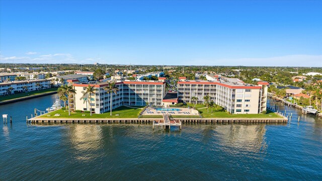 birds eye view of property featuring a water view