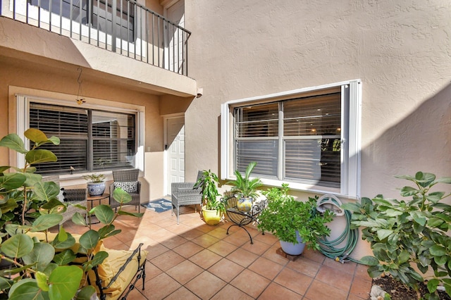 view of patio with a balcony