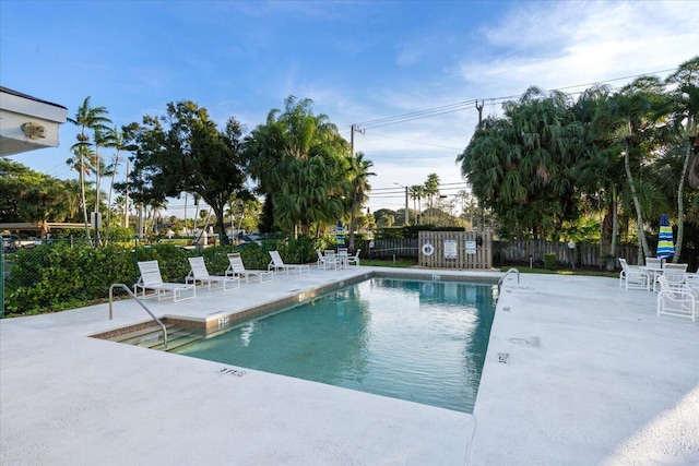 view of swimming pool featuring a patio