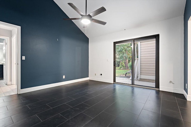 tiled empty room featuring ceiling fan and lofted ceiling