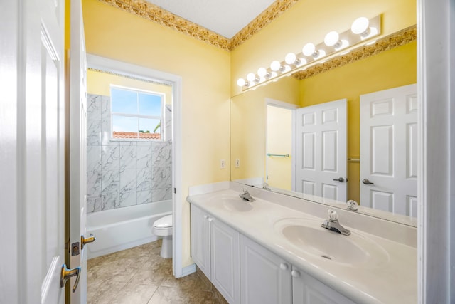 bathroom with washtub / shower combination, a sink, toilet, and double vanity