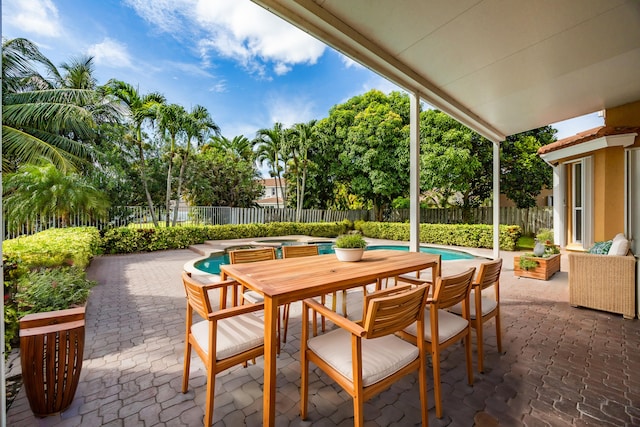 view of patio featuring a fenced backyard and a fenced in pool