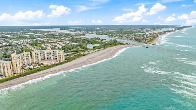 aerial view with a view of the beach and a water view