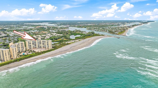 aerial view featuring a view of the beach and a water view