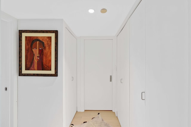 hallway with light tile patterned flooring