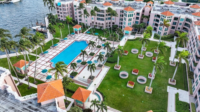 birds eye view of property with a water view