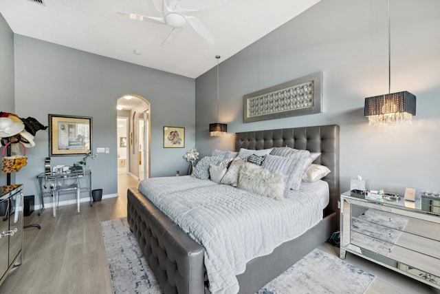 bedroom featuring ceiling fan and hardwood / wood-style flooring