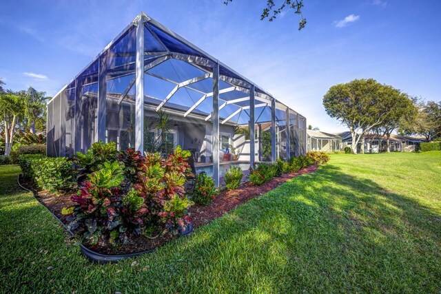 view of yard featuring a lanai