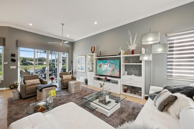 living room with ceiling fan and crown molding