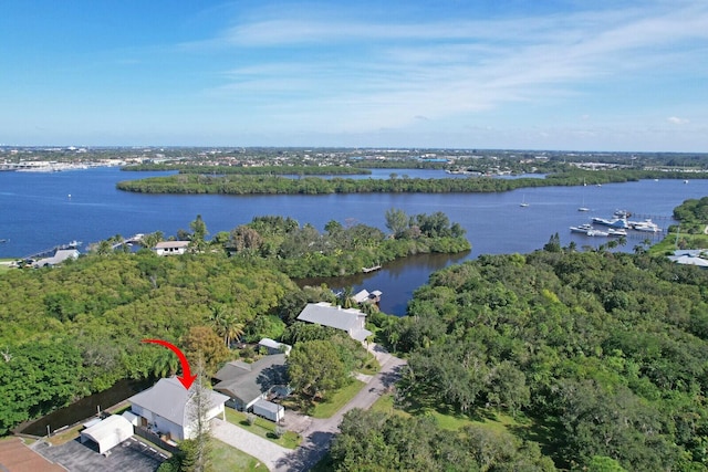 drone / aerial view featuring a water view