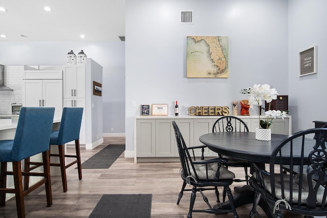 dining room featuring light hardwood / wood-style floors