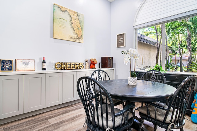 dining space with light wood-type flooring