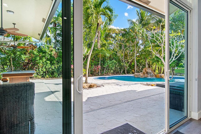 doorway featuring hardwood / wood-style floors, ceiling fan, and billiards