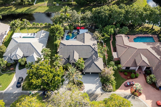 bird's eye view with a water view