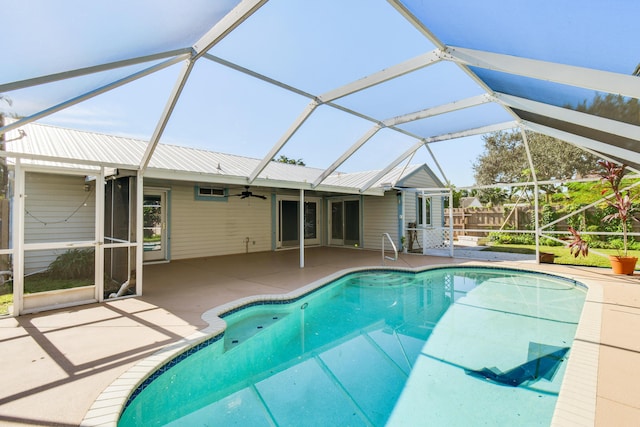 view of pool with a lanai and a patio