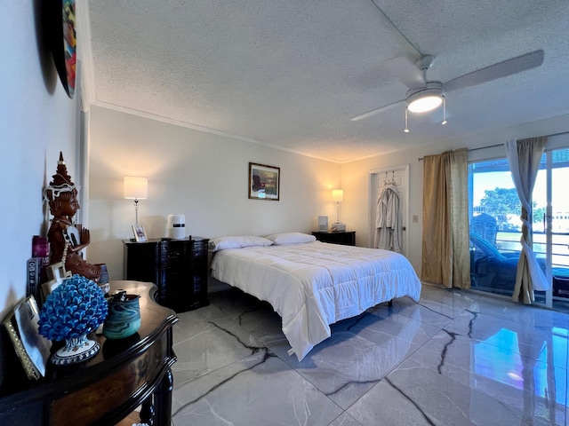 bedroom featuring ceiling fan, access to exterior, a textured ceiling, and crown molding