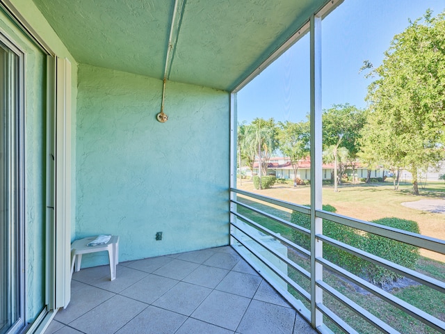 unfurnished sunroom featuring a wealth of natural light