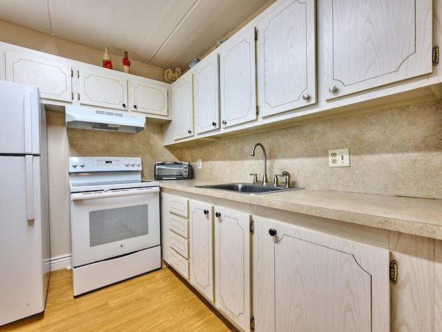 kitchen featuring white appliances, sink, light wood-type flooring, tasteful backsplash, and white cabinetry