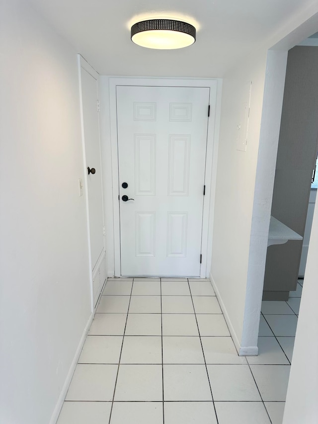 entryway featuring light tile patterned floors