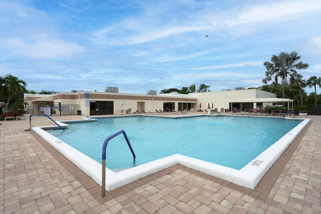 view of pool featuring a patio