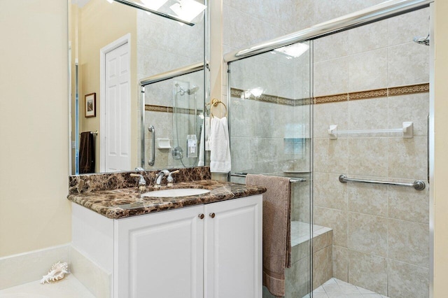 bathroom featuring vanity and walk in shower