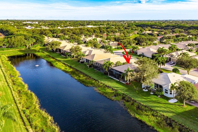 birds eye view of property featuring a water view