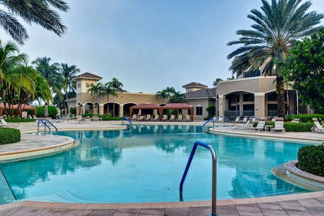 view of swimming pool with a patio area