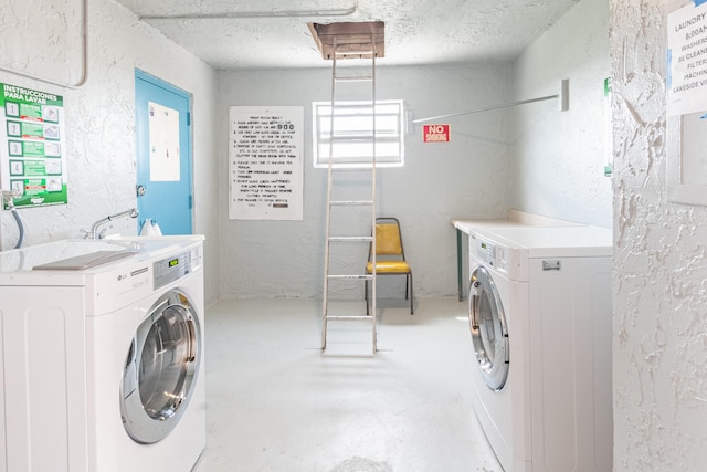 clothes washing area featuring washing machine and dryer