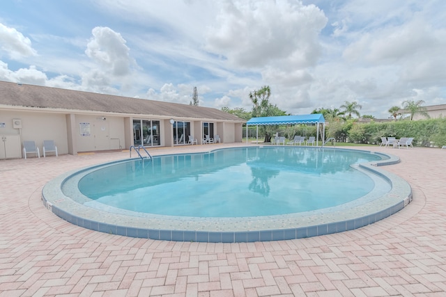 view of pool with a patio area